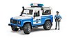 Land Rover Defender Station Wagon Police vehicle and policeman