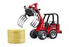 Schäffer Compact loader 2630 with bale gripper + bale