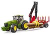 John Deere 7930 with forestry trailer and 4 trunks
