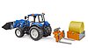 New Holland T5. 120 avec chargeur avant, coffre de chargement et fourches