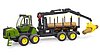 Porteur forestier John Deere 1210E avec grappin à bois