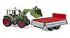 Fendt Vario 211 with frontloader and tipping trailer