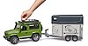 Land Rover Defender con remolque de caballos