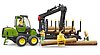Porteur forestier John Deere 1210E avec grappin à bois