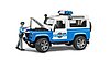 Land Rover Defender Station Wagon Police vehicle and policeman