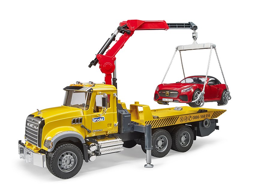02829 - MACK Granite tow truck with BRUDER Roadster