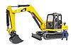 Cat® Mini Excavator with worker