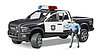 Camioneta policial RAM 2500 con policía