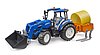 New Holland T5. 120 avec chargeur avant, coffre de chargement et fourches