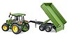 John Deere 5115 M con remolque de carga