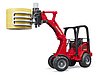 Schäffer Compact loader 2630 with bale gripper + bale