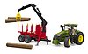 John Deere 7R 350 with forestry trailer and 4 trunks
