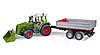 Fendt Vario 211 with frontloader and tipping trailer