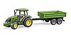 John Deere 5115 M con remolque de carga