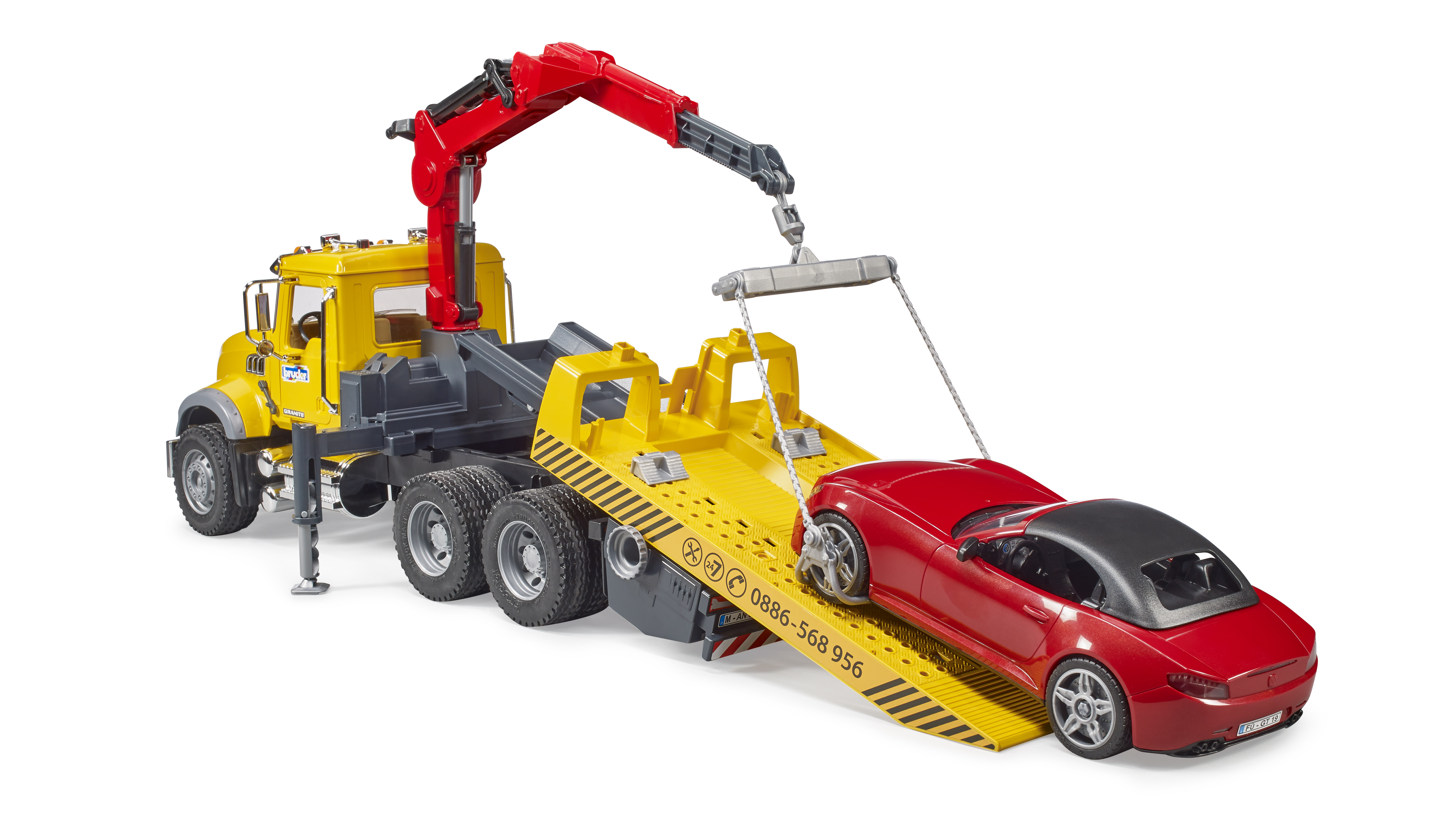 Camion de remorquage MACK Granite avec roadster BRUDER