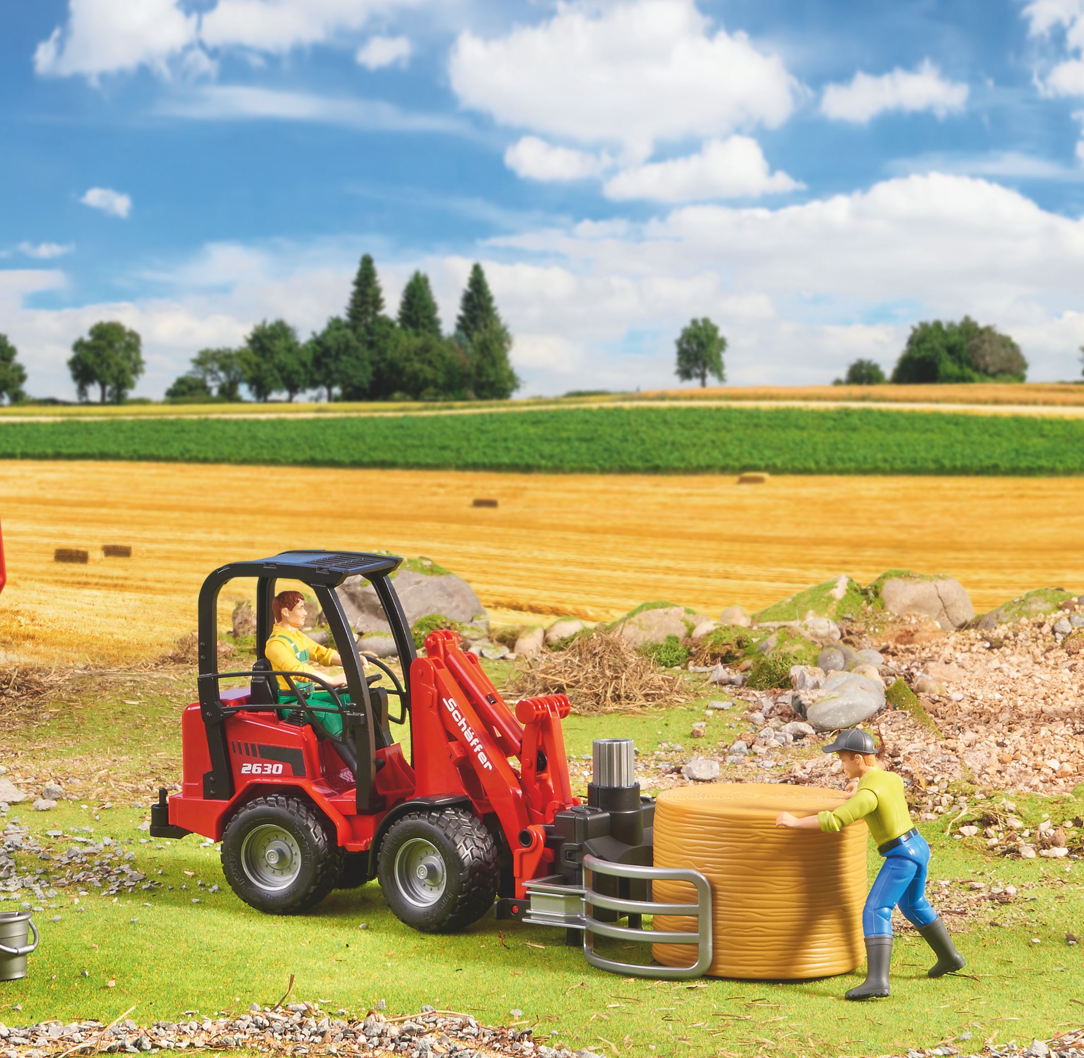 Cargador agrícola Schäffer 2630 con pinza para pac Cargador agrícola Schäffer 2630 con pinza para pac