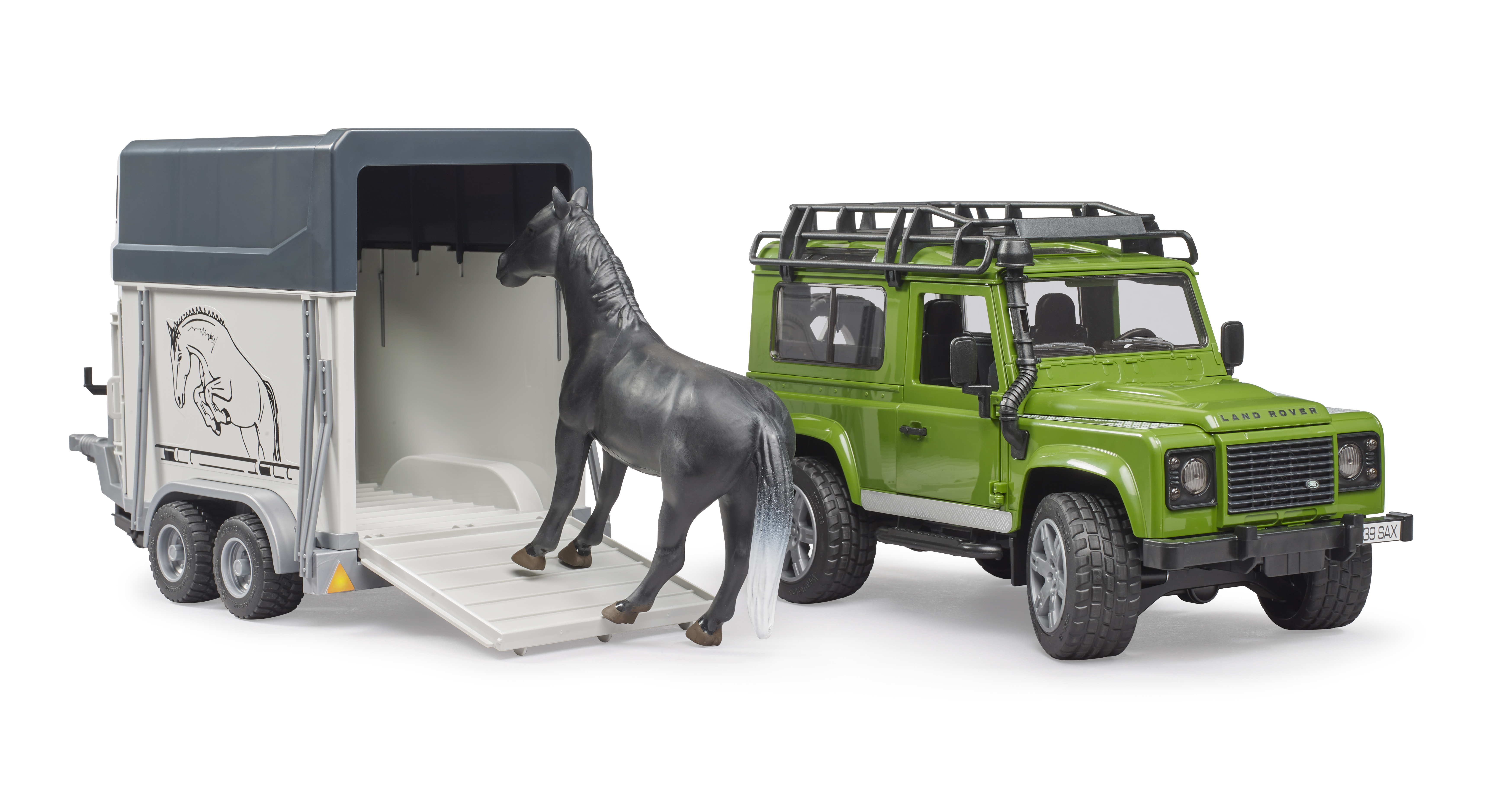 Land Rover Defender con remolque de caballos Land Rover Defender con remolque de caballos