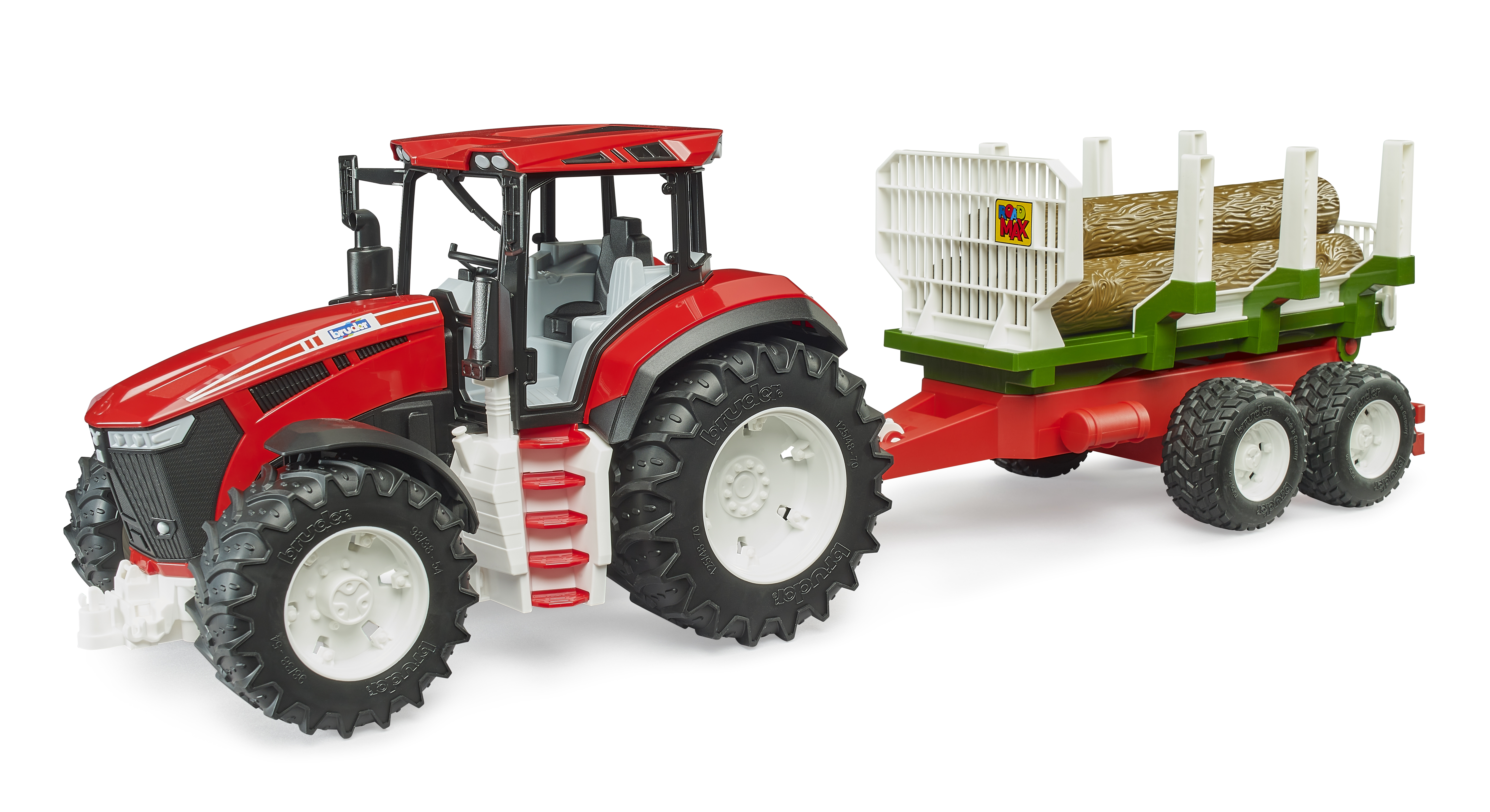 Tracteur ROADMAX avec remorque forestière et 3 troncs d’arbre
