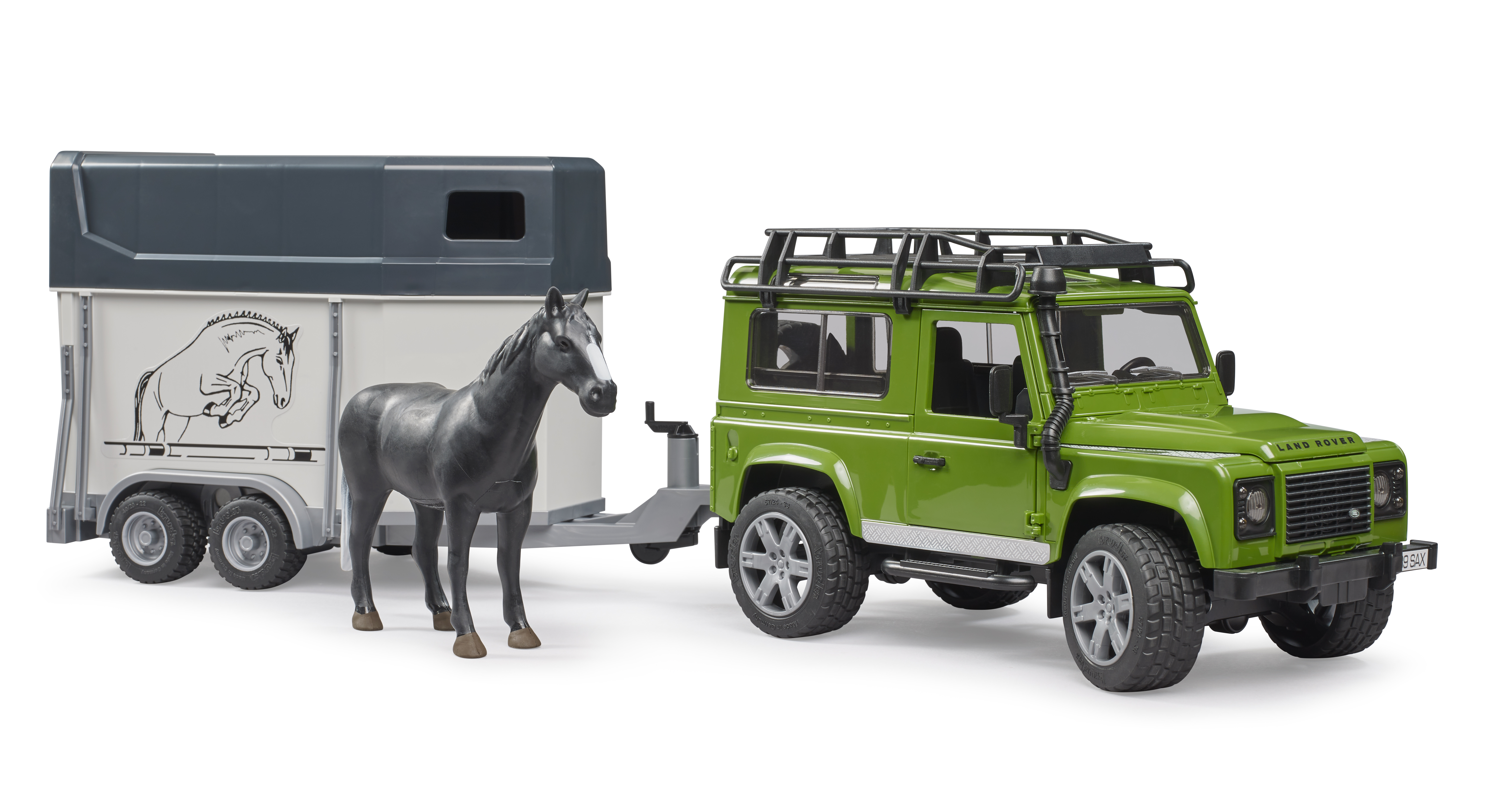 Land Rover Defender con remolque de caballos